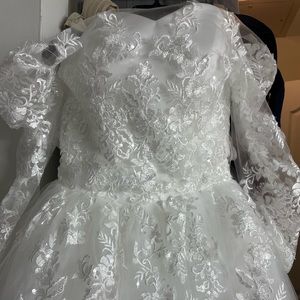 Brand new wedding. Never worn with tags size M